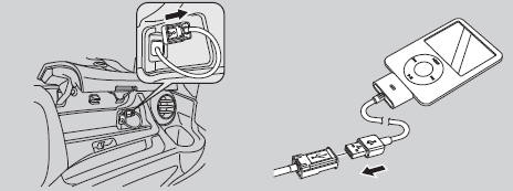 1. Unclip the USB connector in the center console and loosen the adapter