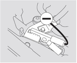 4. Connect the second jumper cable to the negative ( - ) terminal on the booster