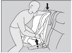 5. Grab the shoulder part of the seat belt near