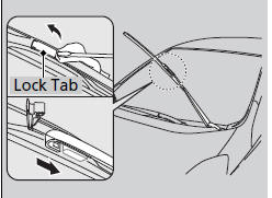 2. Place a cloth on the edge of the lock tab.