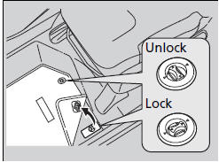 The driver’s floor mat hooks over the floor