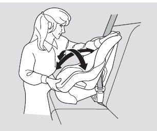 5. Push and pull the child seat forward and from side-to-side to verify that