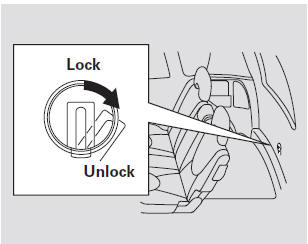 Push the release lever to the right as shown.