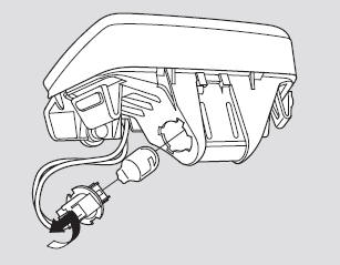 3. Pull the bulb straight out of its socket. Push the new bulb straight into