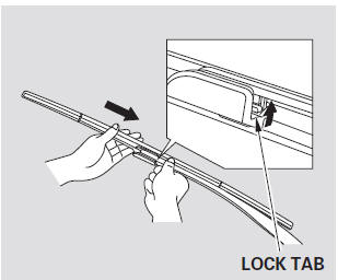 2. Disconnect the blade assembly from the wiper arm: