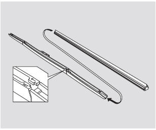 5. Place the top of the wiper blade on the end of the blade assembly, and slide