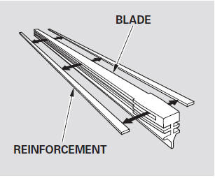 4. Slide the new blade into the wiper arm. Make sure it is engaged in the slot