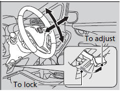 1. Pull the steering wheel adjustment lever up.