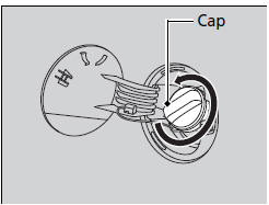 4. Remove the fuel fill cap slowly. If you hear a