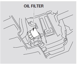 3. Remove the oil filter, and let the remaining oil drain. A special wrench (available